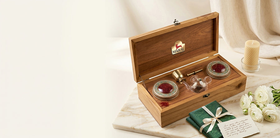 An open wooden MARAL gift presentation
